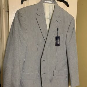 Chaps blue and white sports coat. Size is 42R. Never worn. Smudged on front